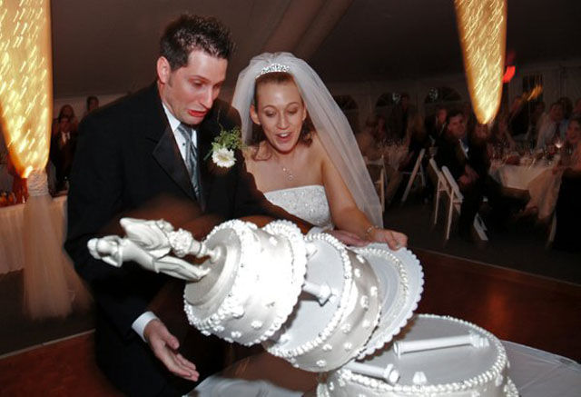 wedding cake thrown at bride